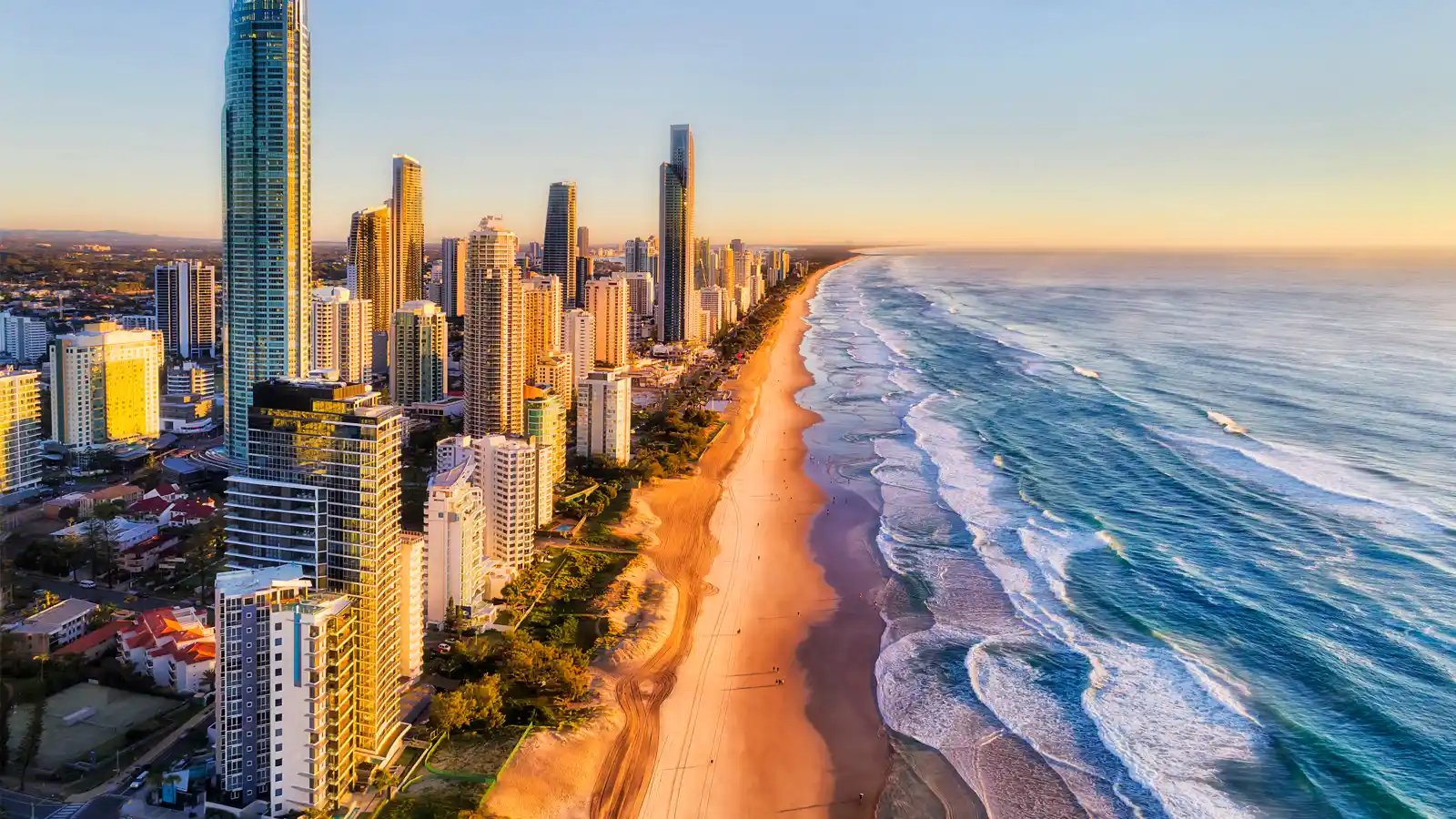 Gold Coast beachfront apartment buildings representing the Queensland Management Rights industry, celebrating Holmans as a finalist in the 2026 ARAMA Service Provider of the Year Awards.